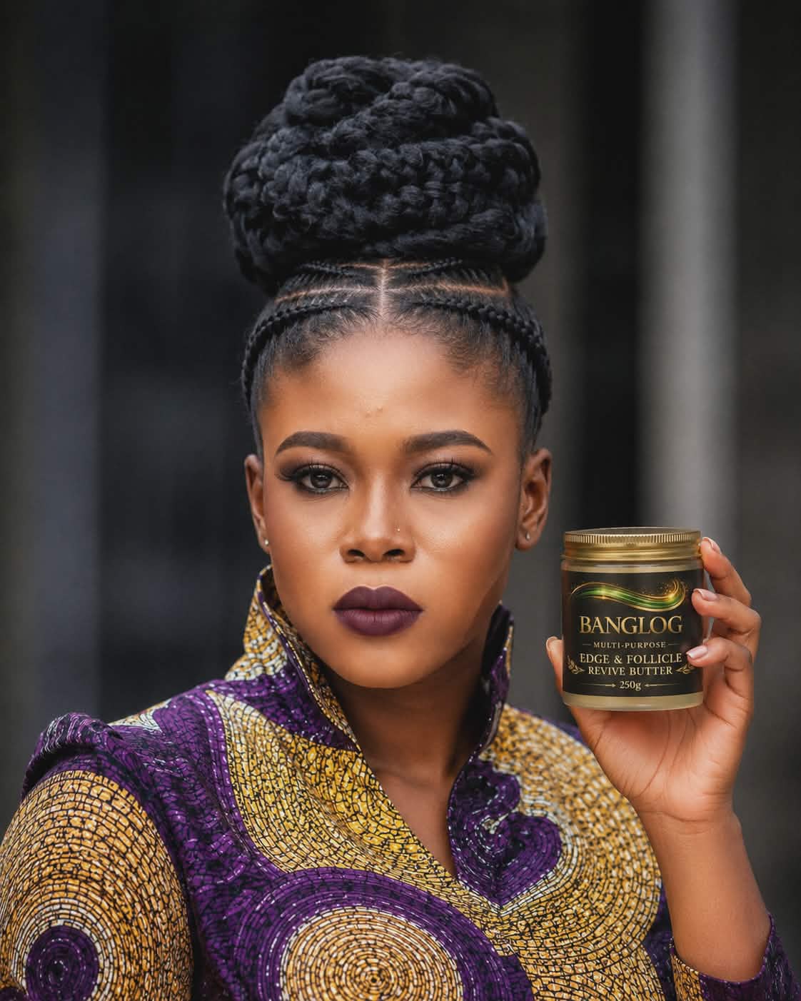 BANGLOG HAIR MAGIC Edge and Follicle Revive Butter 250g — model in traditional attire holding jar
